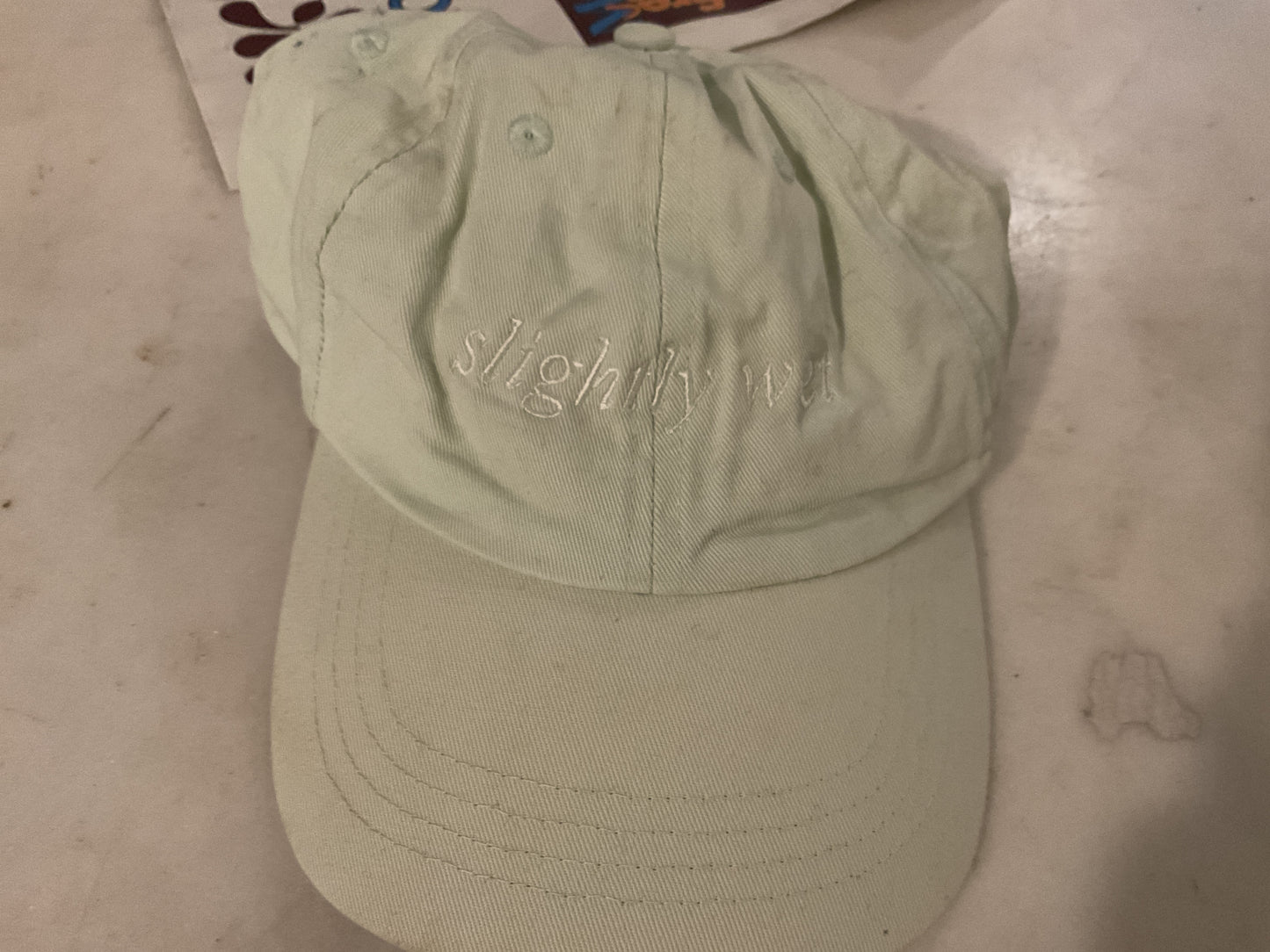 CAP- light green slightly wet